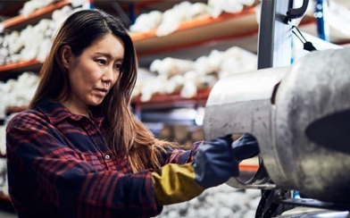 Women Running a machine